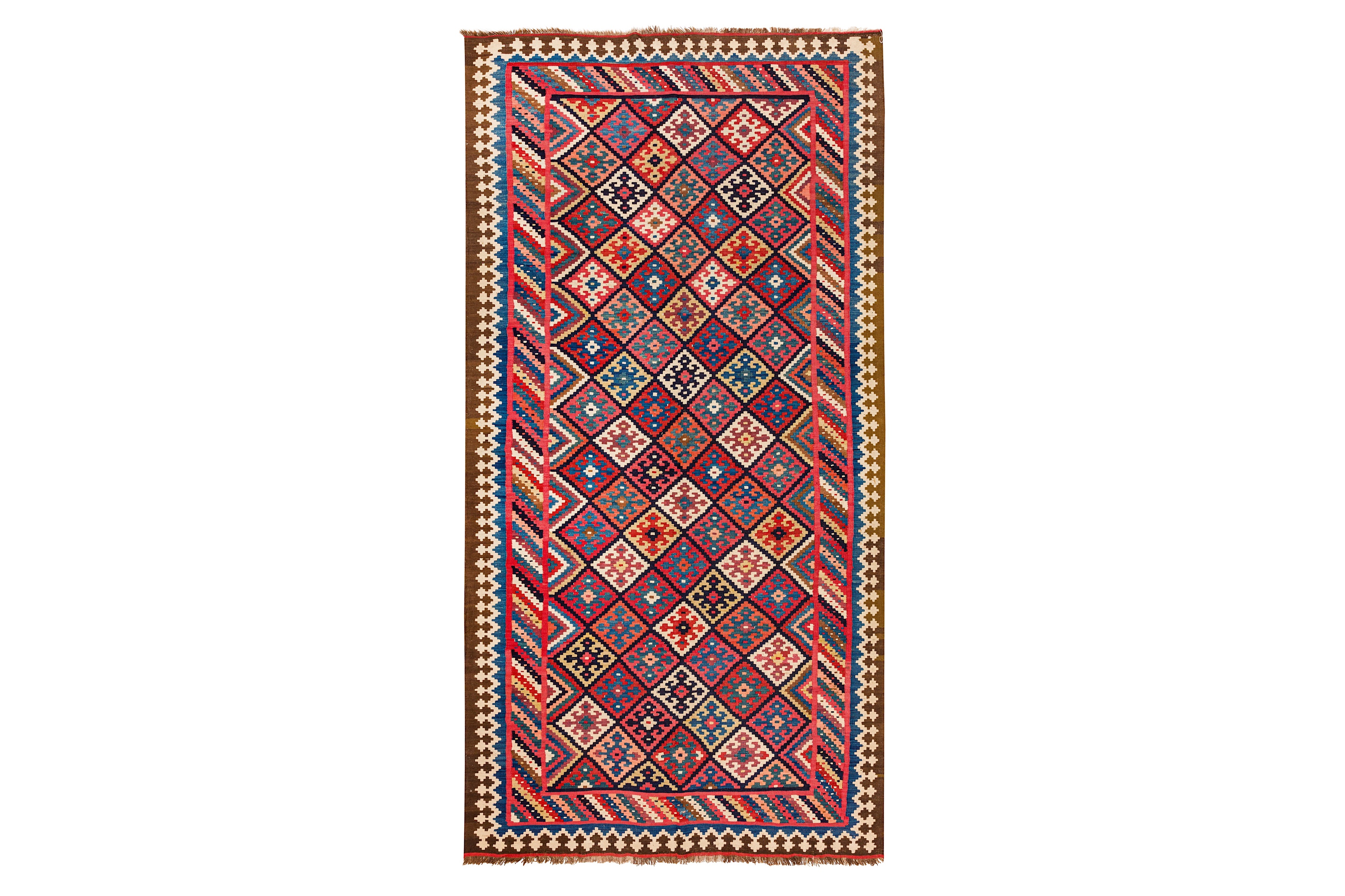AN ANTIQUE NORTH-WEST PERSIAN KILIM