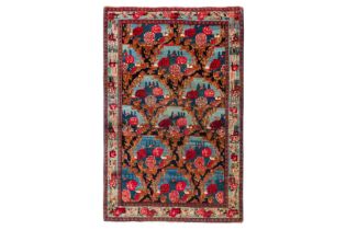 AN ANTIQUE SENNEH RUG, WEST PERSIA