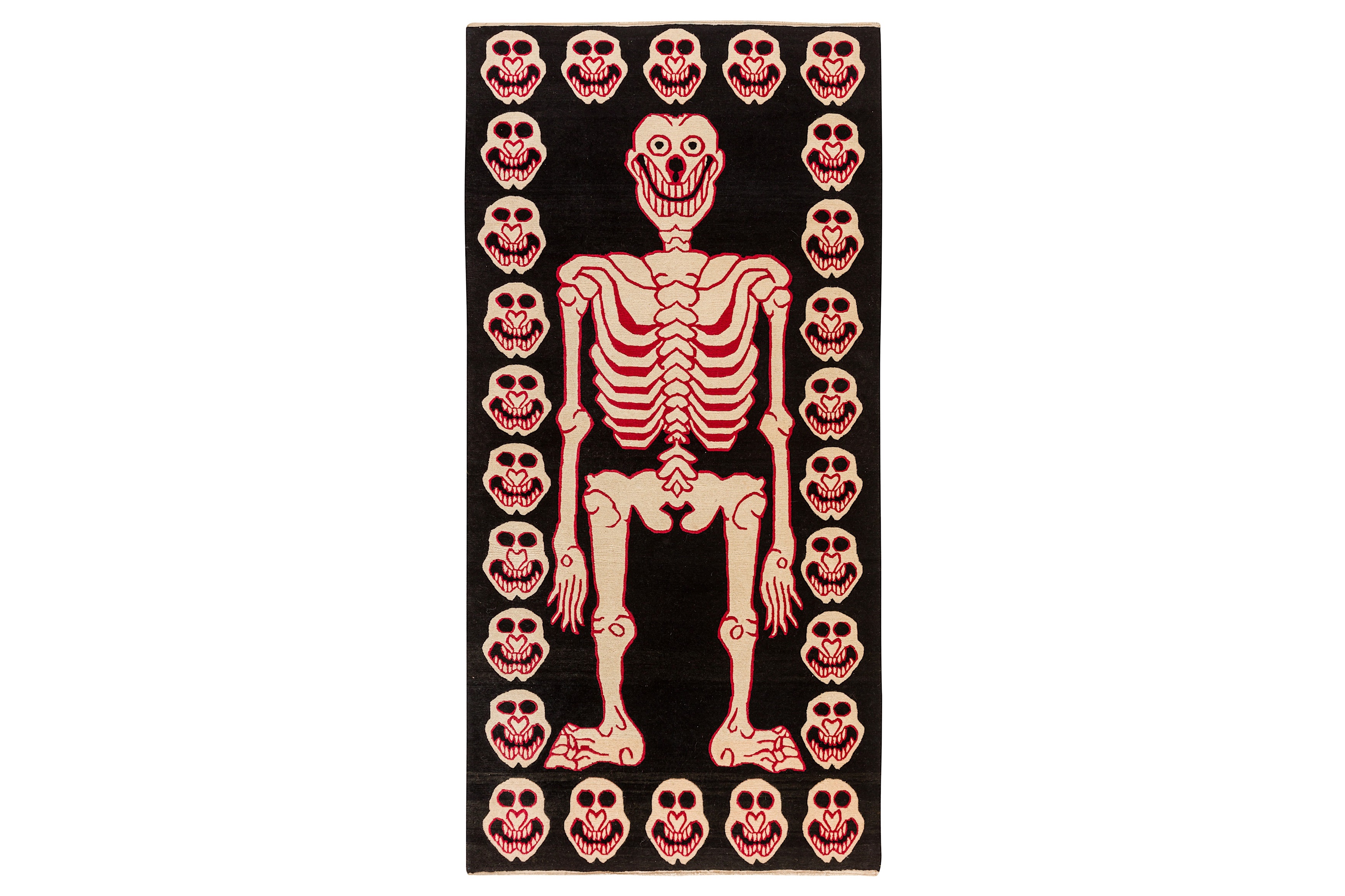 A VERY UNUSUAL TIBETAN SKELETON TANTRIC RUG