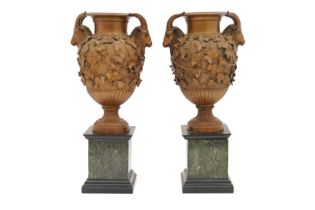 A PAIR OF MID 19TH CENTURY ITALIAN BRONZE URNS, ATTRIBUTED TO THE WORKSHOP OF BENEDETTO BOSCHETTI