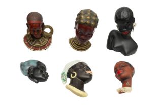 A GROUP OF WEST GERMAN AND OTHER CENTRAL EUROPEAN MASKS AND A BUST OF BLACK LADIES