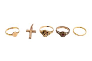 A COLLECTION OF FOUR RINGS AND A CROSS PENDANT