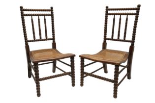 A PAIR OF VICTORIAN BEECH BOBBIN TURNED CHAIRS
