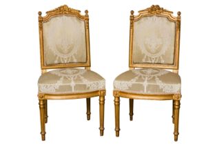 ATTRIBUTED TO SIMON LOSCERTALES BONA, SPAIN; A PAIR OF LOUIS XVI STYLE GILTWOOD SIDE CHAIRS