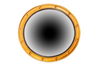 A REGENCY STYLE CONVEX MIRROR, LATE 19TH CENTURY
