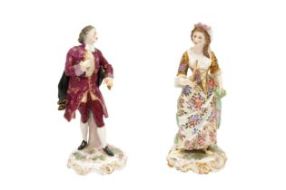 A PAIR OF 19TH CENTURY CONTINENTAL PORCELAIN FIGURES AFTER CHELSEA