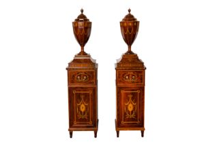 A PAIR OF MARQUETRY INLAID MAHOGANY NEOCLASSICAL KNIFE URNS AND CABINETS