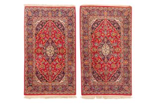 A PAIR OF KASHAN RUGS, CENTRAL PERSIA