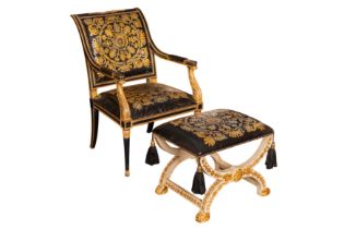AN EMPIRE STYLE ARMCHAIR AND MATCHING FOOTSTOOL