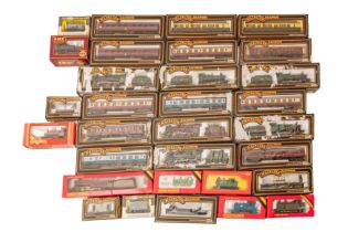 A LARGE GROUP OF ASSORTED BOXED OO GAUGE LOCOMOTIVES AND ROLLING STOCK