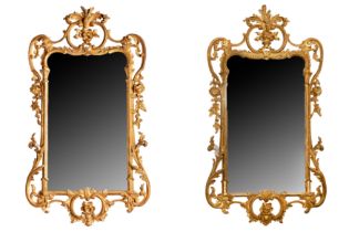 A PAIR OF ROCOCO CARVED GILTWOOD WALL MIRRORS, 18TH CENTURY