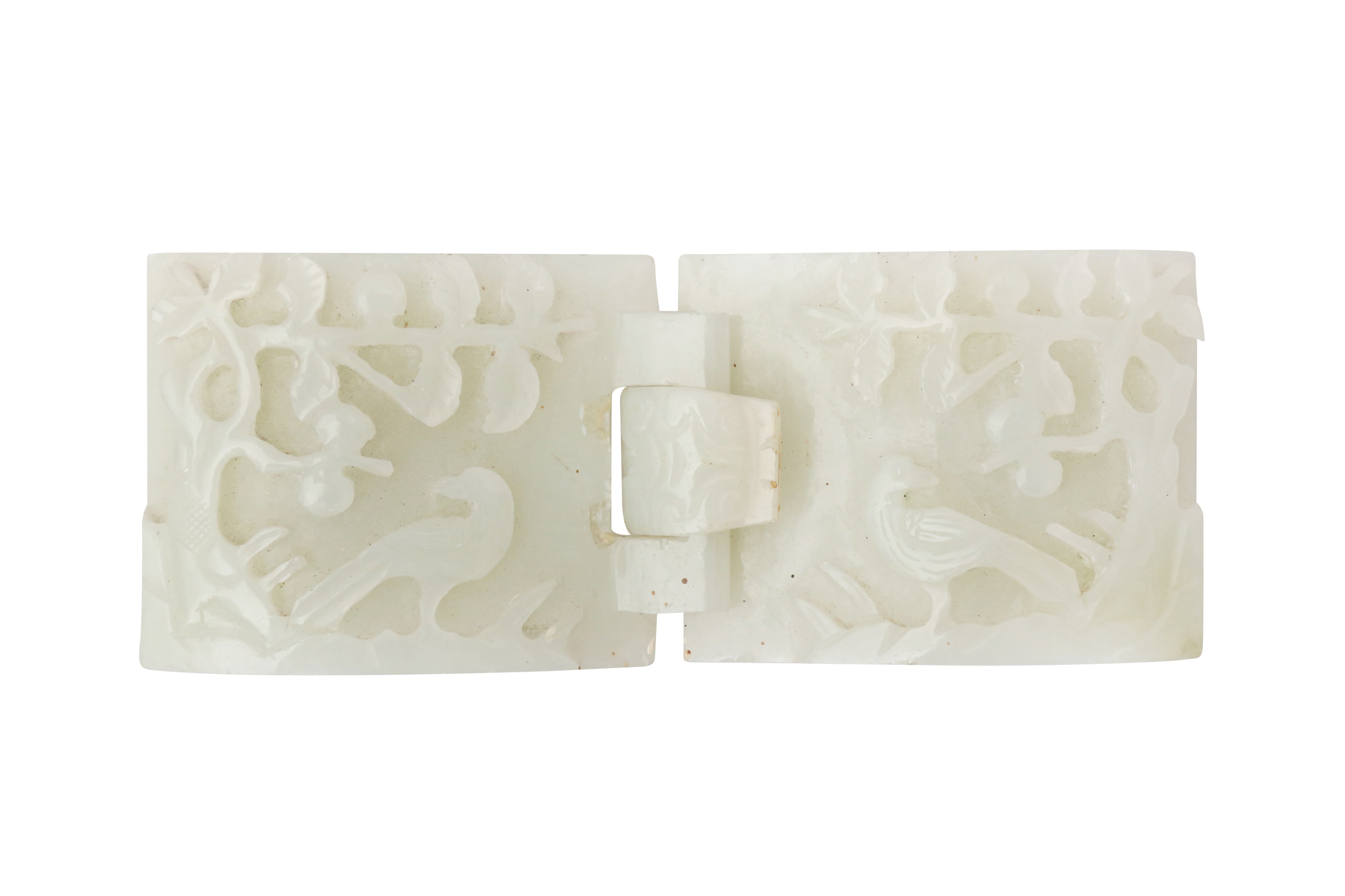 A CHINESE PALE-CELADON JADE 'BIRD AND BLOSSOMS' BELT BUCKLE 清 青白玉花鳥圖紋帶扣