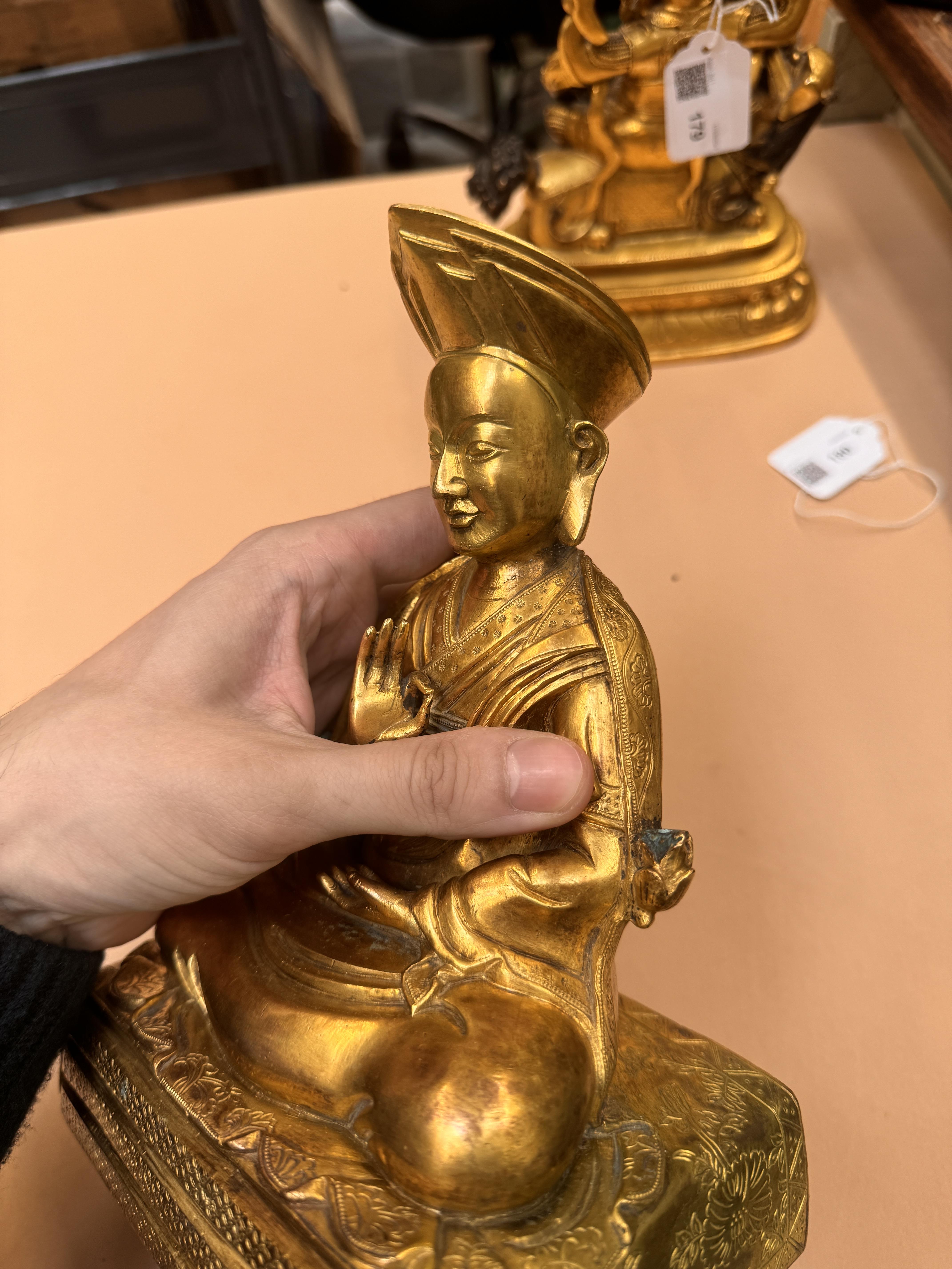 A SINO-TIBETAN GILT BRONZE FIGURE OF THE THIRD CHANGKYA HUTUKTU, ROLPAI DORJE 清十八世紀 銅鎏金三世章嘉呼圖克圖若必多吉坐 - Image 3 of 23