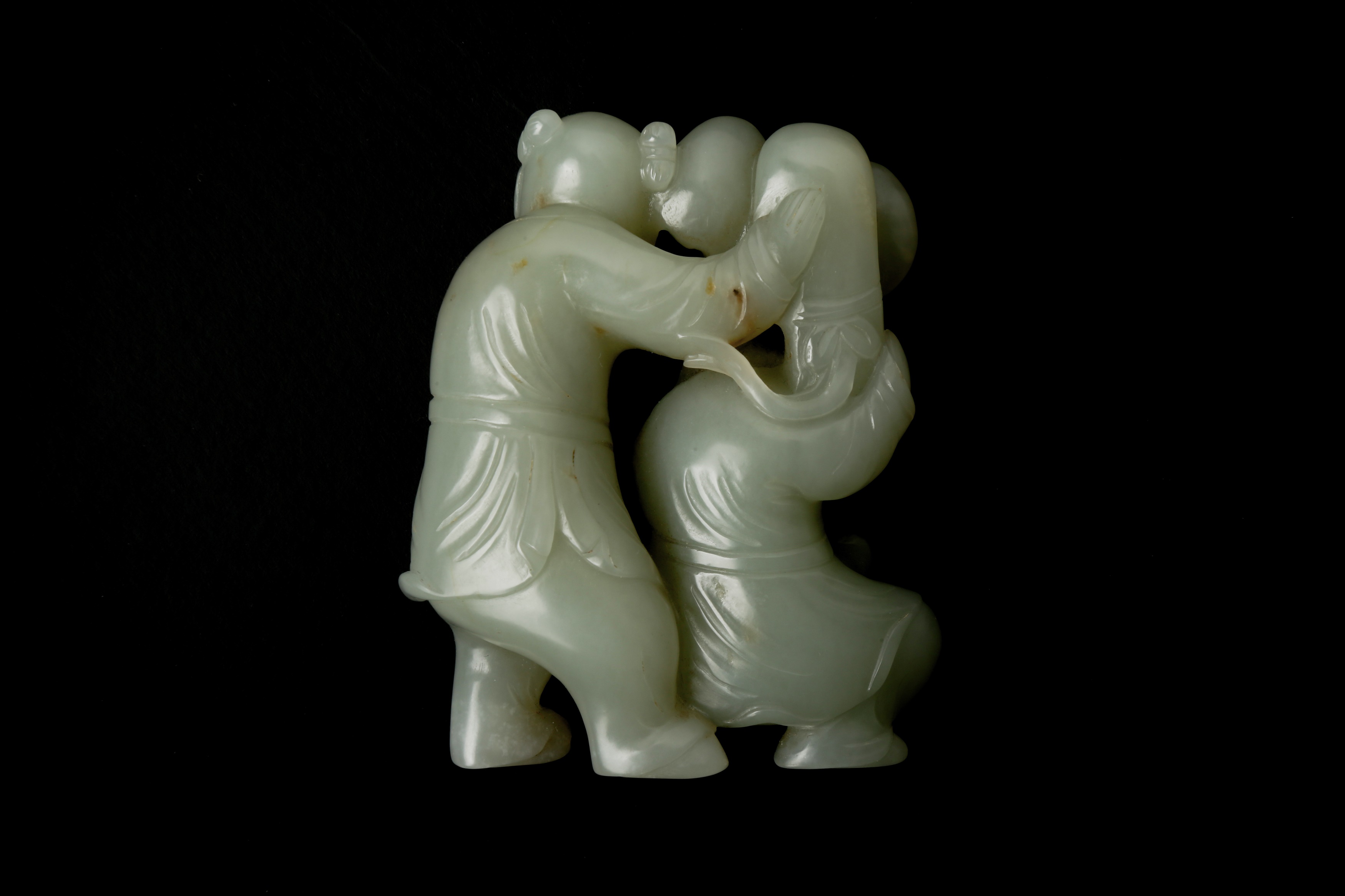 A CHINESE CELADON JADE 'BOYS' GROUP 清 青玉祝壽童子擺件 - Image 2 of 2