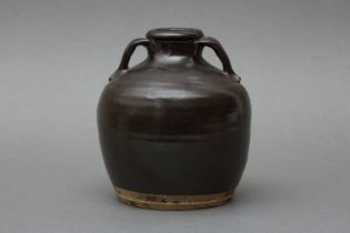 A CHINESE 'OIL SPOT' TWIN-HANDLED JAR 明 黑釉油滴雙耳罐