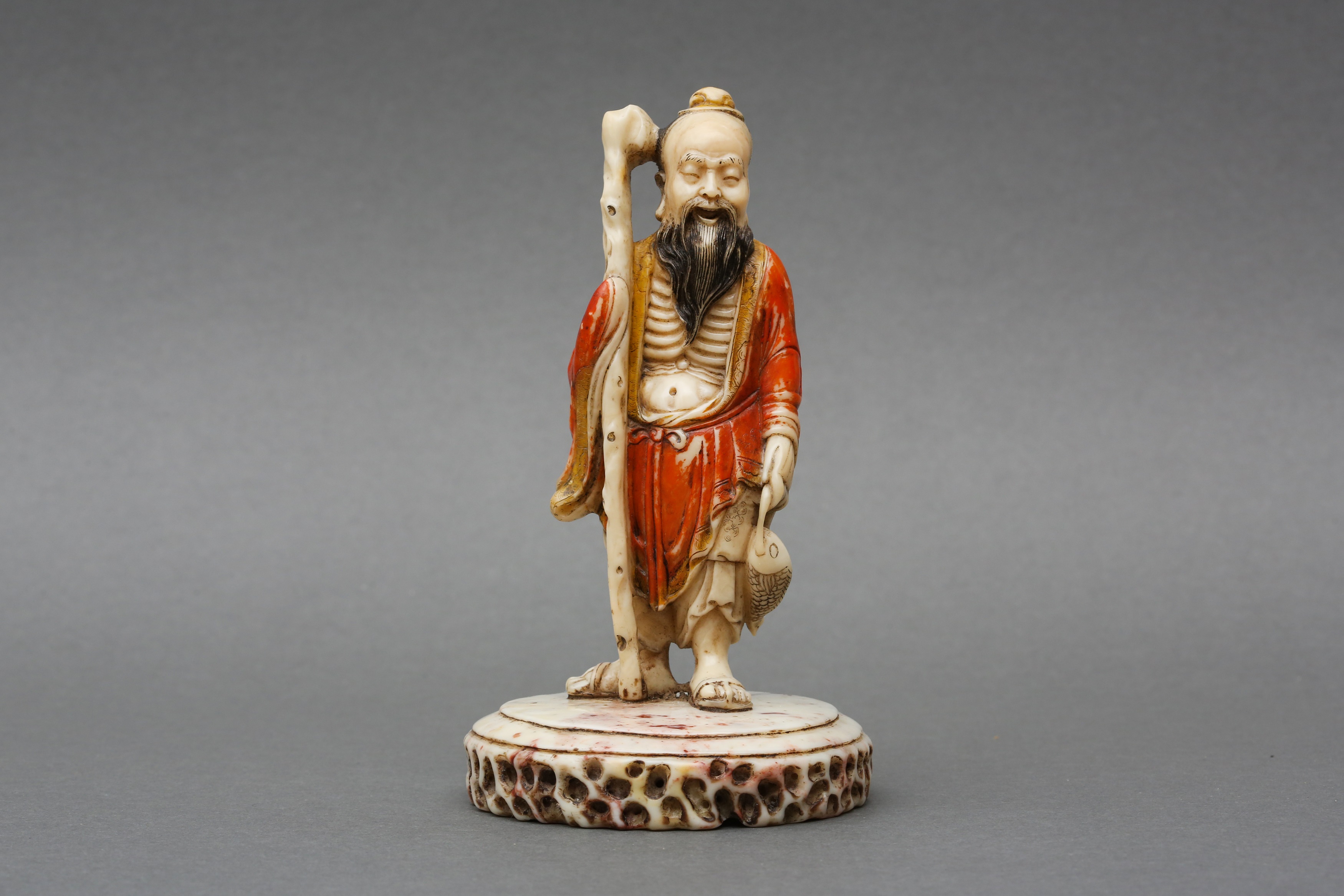 A CHINESE SOAPSTONE FIGURE OF AN EMACIATED LUOHAN 清十八至十九世紀 壽山石羅漢像