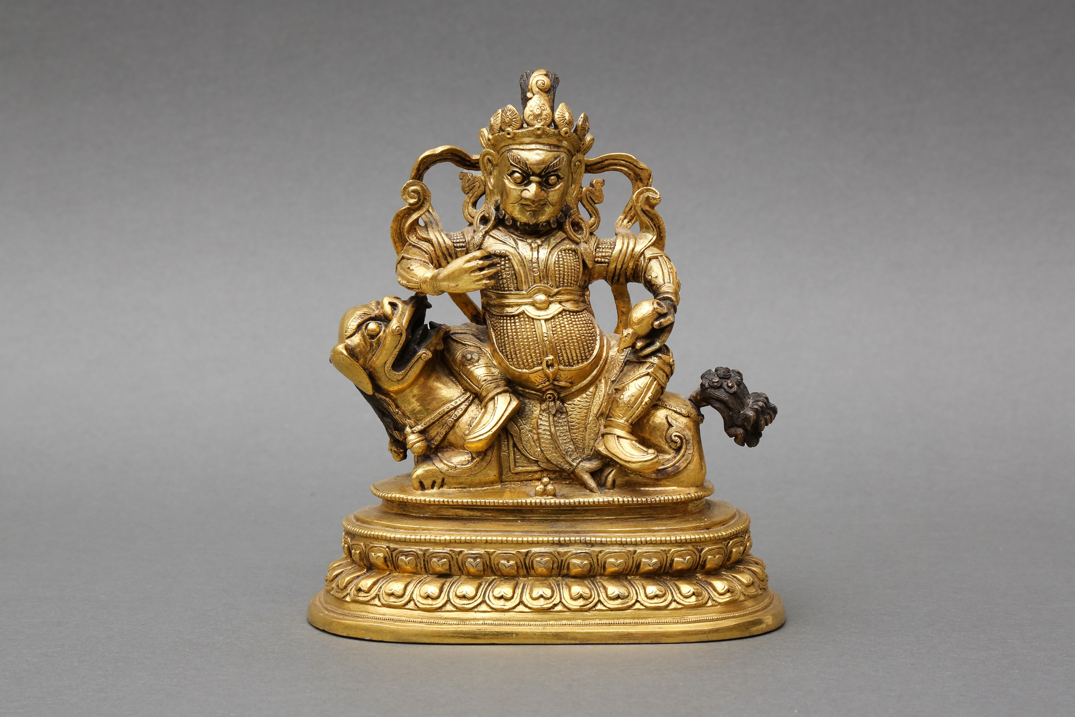 A SINO-TIBETAN GILT-BRONZE FIGURE OF VAISHRAVANA 十九世紀或後期 銅鎏金多聞天王像