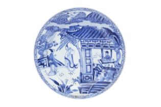 A CHINESE BLUE AND WHITE 'ROMANCE OF THE WESTERN CHAMBER' DISH 清雍正 青花繪西廂記盤