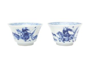 TWO CHINESE BLUE AND WHITE CUPS 清康熙 青花策馬勇戰圖盃兩件 《玉》款