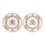 A PAIR OF CHINESE EXPORT FAMILLE-ROSE ARMORIAL DISHES 清十八至十九世紀 外銷粉彩徽章紋盤一對