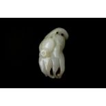 A CHINESE PALE CELADON 'FOSHOU' FINGER CITRON JADE CARVING 清 青白玉佛手