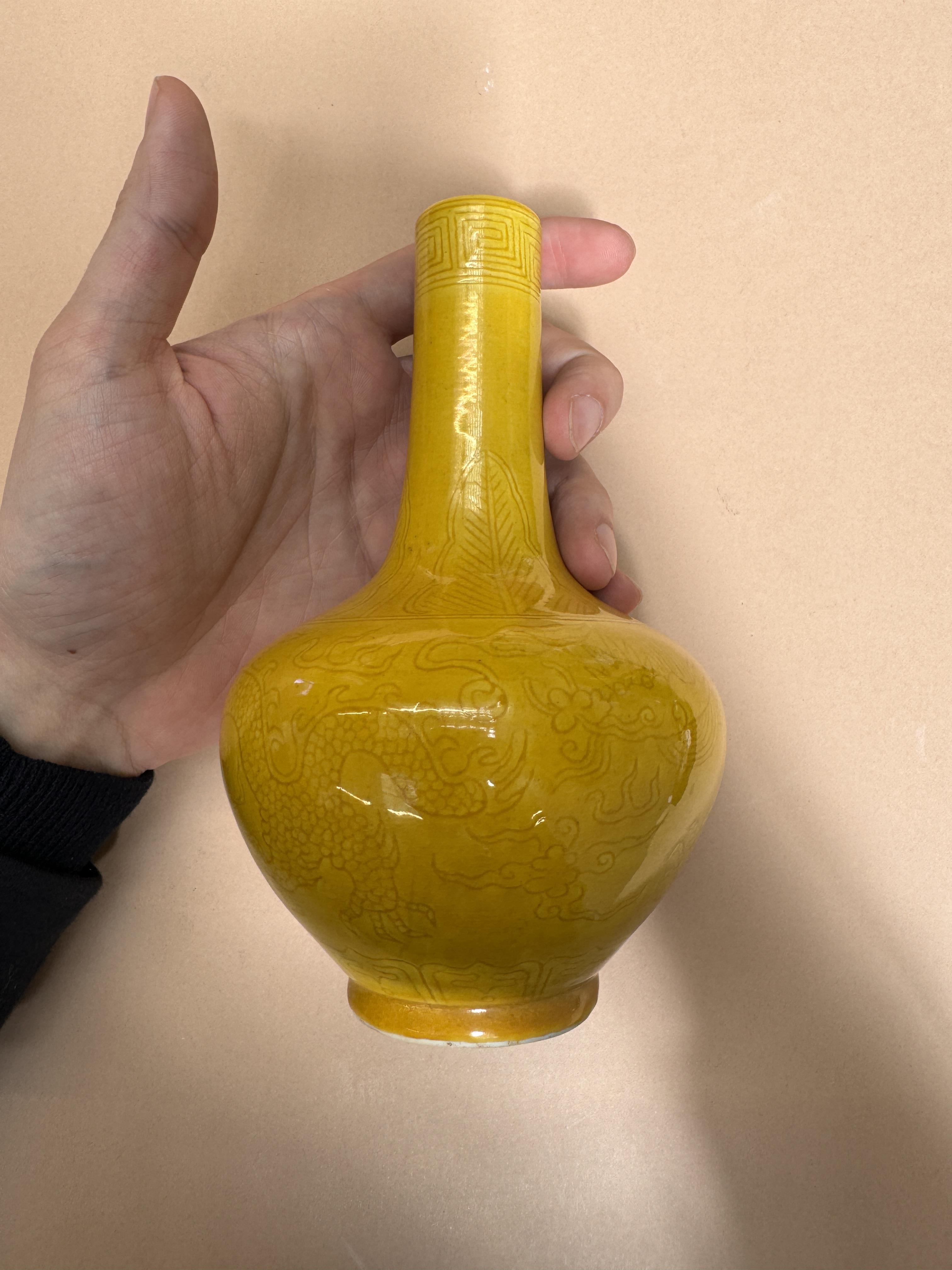 A SMALL CHINESE MONOCHROME YELLOW-GLAZED 'DRAGON' VASE 清十八世紀 黃釉暗刻龍紋瓶 - Image 8 of 12