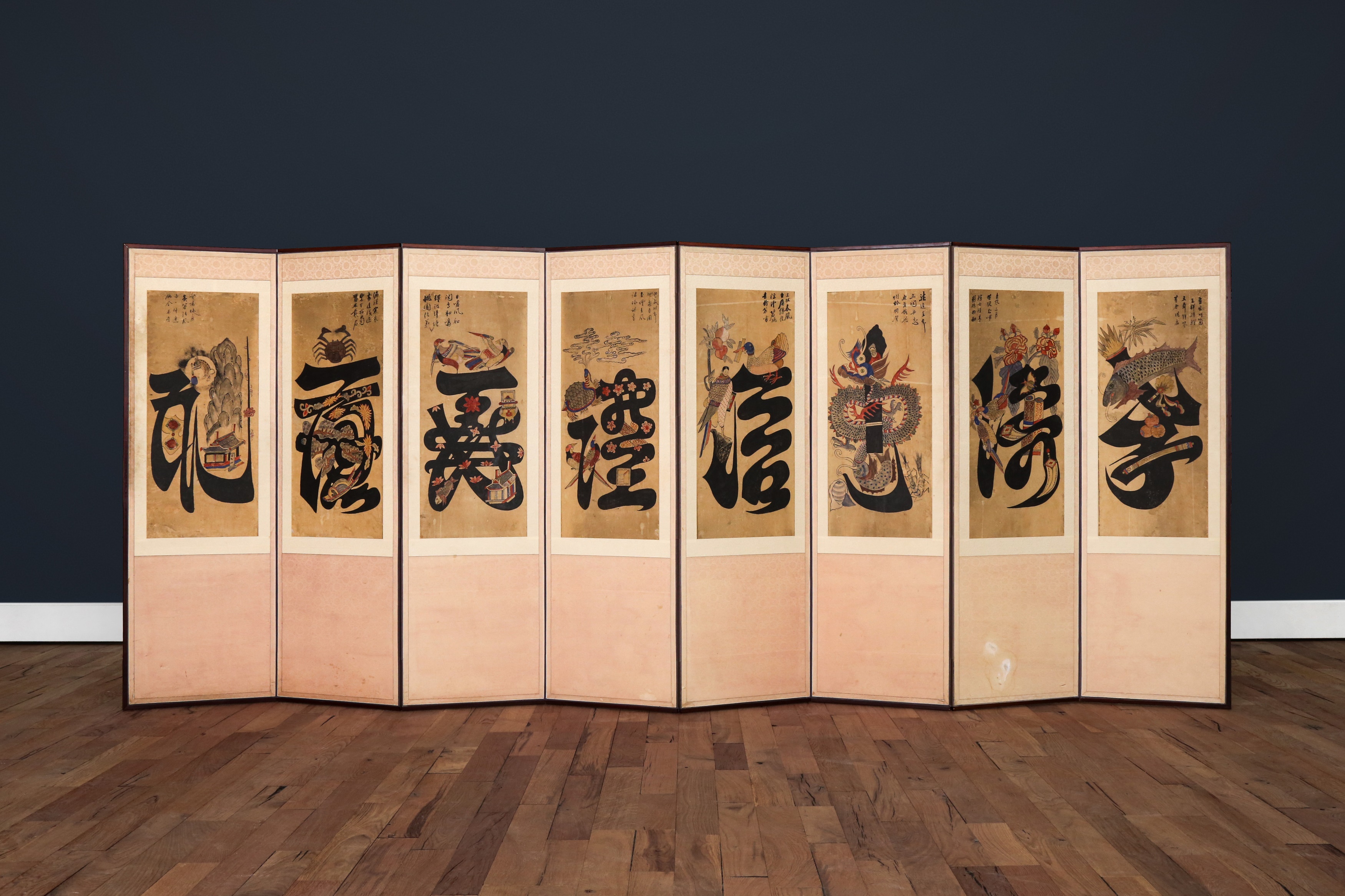 A LARGE KOREAN EIGHT CONFUCIAN VIRTUES 'MUNJADO' EIGHT-PANEL SCREEN Eight Pictorial Ideographs (The