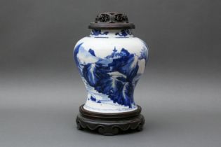 A CHINESE BLUE AND WHITE 'LANDSCAPE' VASE 清康熙 青花山水圖紋瓶