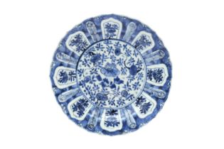 A CHINESE BLUE AND WHITE 'FLORAL' DISH 清康熙 青花花卉紋盤