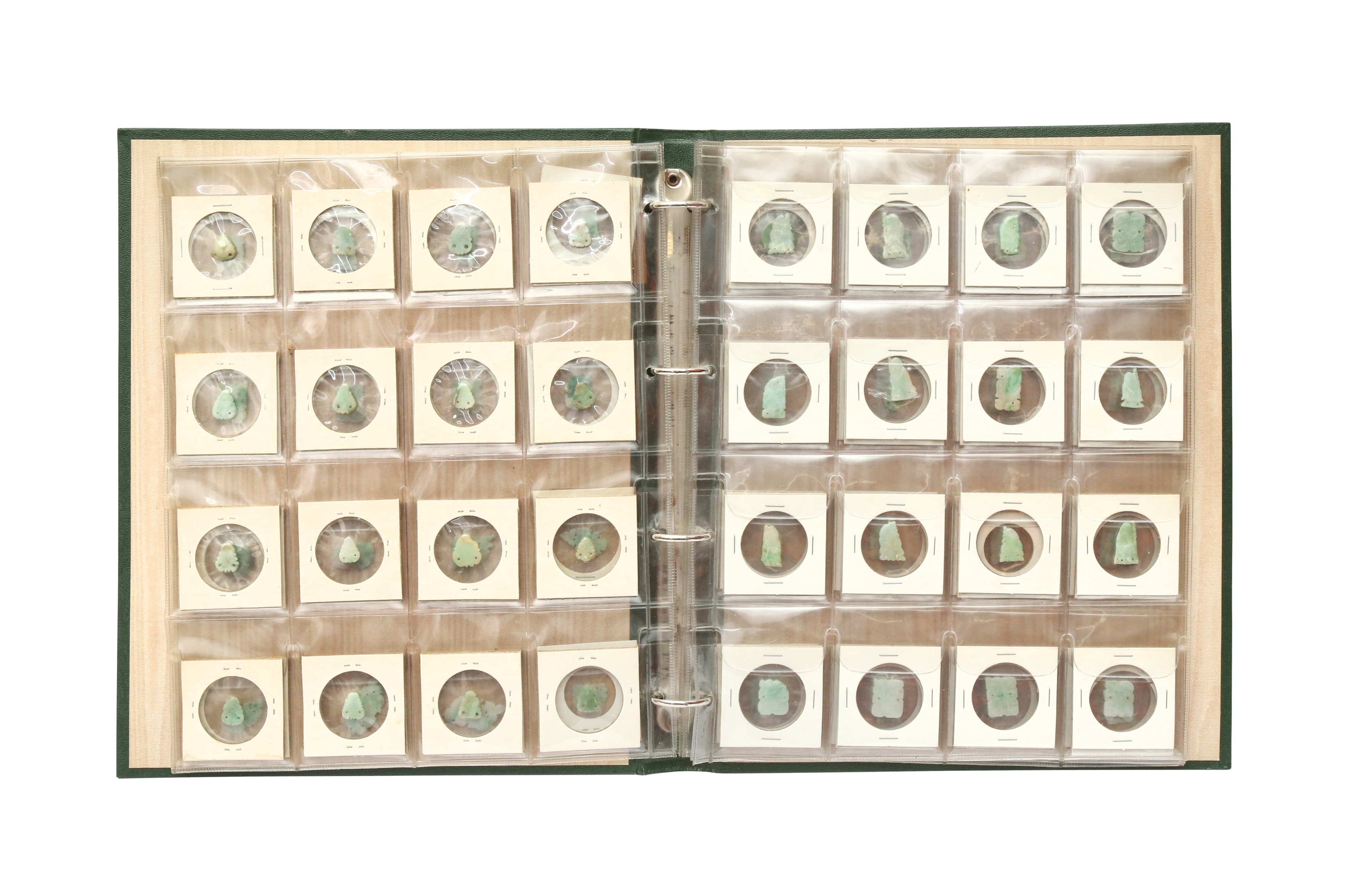 A FOLDER OF EIGHTY CHINESE MINIATURE JADE CARVINGS 袖珍玉雕八十件