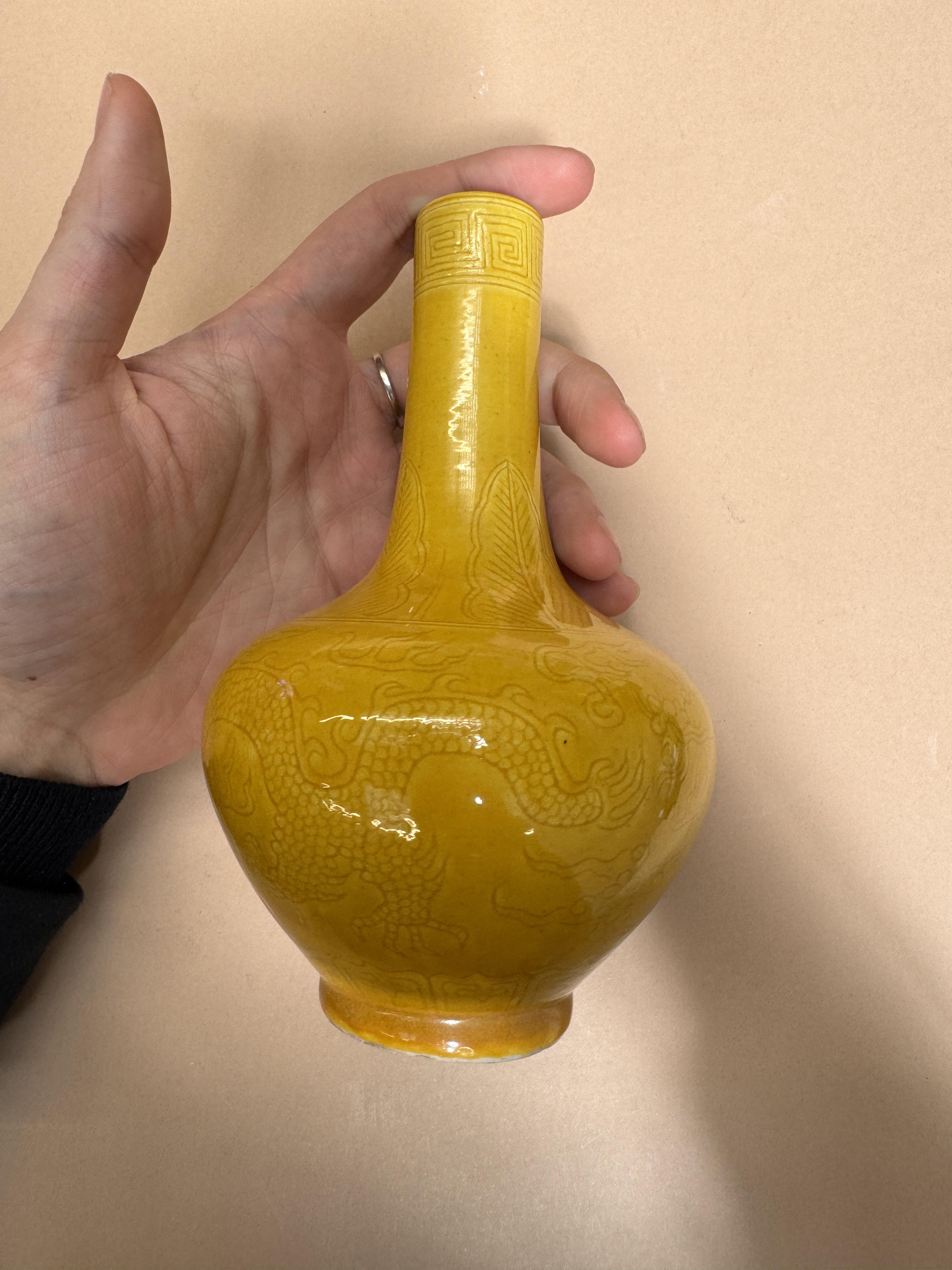 A SMALL CHINESE MONOCHROME YELLOW-GLAZED 'DRAGON' VASE 清十八世紀 黃釉暗刻龍紋瓶 - Image 6 of 12