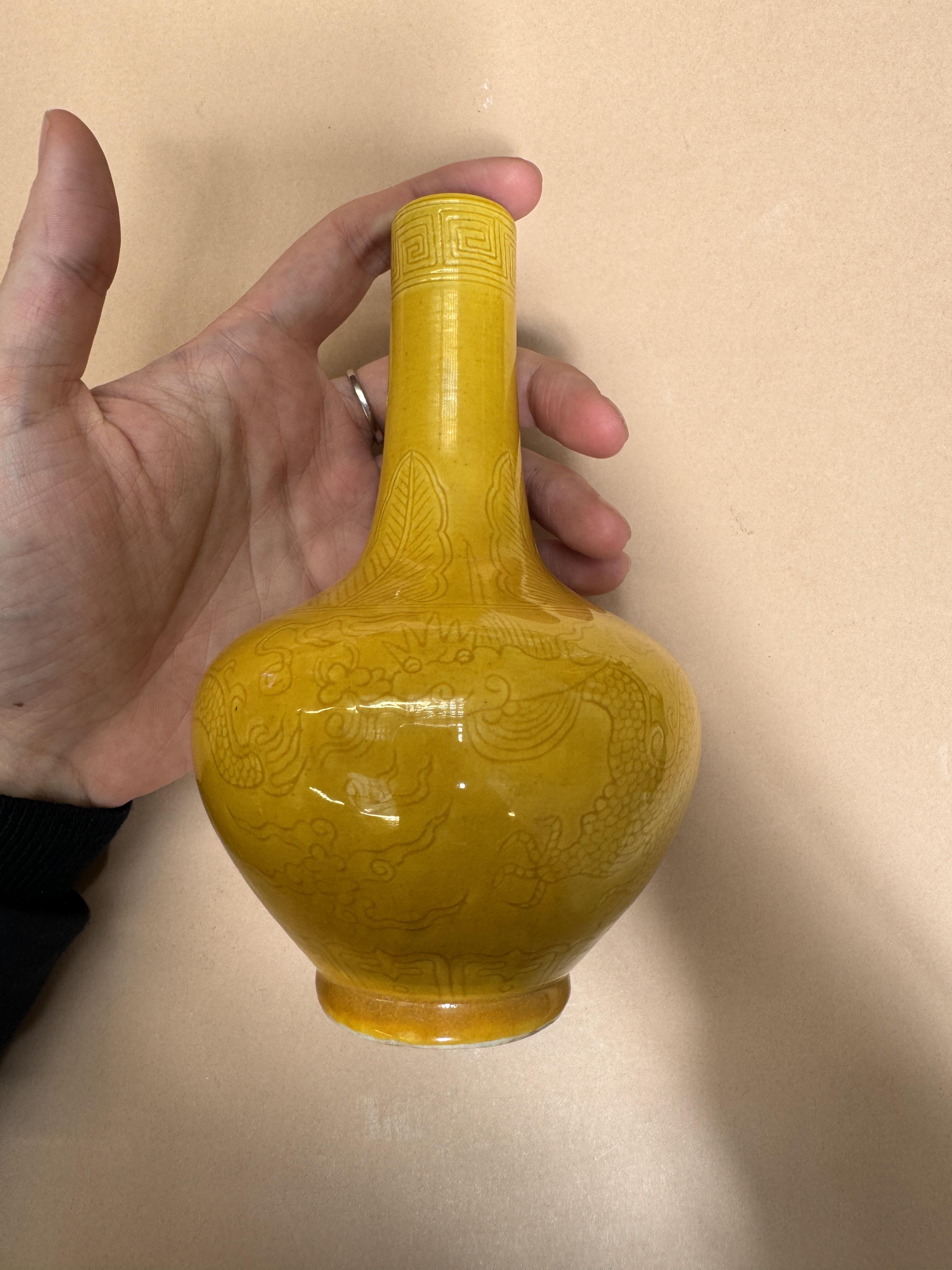 A SMALL CHINESE MONOCHROME YELLOW-GLAZED 'DRAGON' VASE 清十八世紀 黃釉暗刻龍紋瓶 - Image 7 of 12