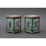 A PAIR OF RARE CHINESE FAMILLE-VERTE BISCUIT OPENWORK BRUSHPOTS, BITONG 清康熙 蘇三彩文章三斗方筆筒一對