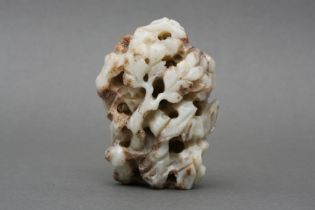 A CHINESE CARVED 'DRAGON AMONG MOUNTAINS' JADE 寮至元 玉雕龍山