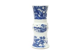 A CHINESE BLUE AND WHITE 'FLORAL' BEAKER VASE, GU 清康熙 青花開光花蟲圖花觚 《大清康熙年製》款