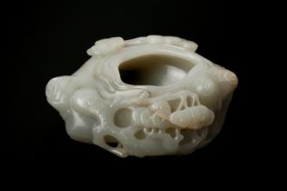 A SMALL CHINESE CARVED CELADON JADE BRUSH WASHER, XI 清 青玉松紋洗