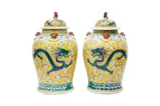 A PAIR OF CHINESE FAMILLE-ROSE YELLOW-GROUND VASES FOR THE STRAITS OR PERANAKAN MARKET 清十九世紀 粉彩黃地雲龍趕