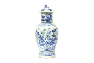 A CHINESE BLUE AND WHITE BALUSTER VASE AND COVER 清十九世紀 青花花鳥圖紋獅鈕蓋罐