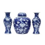 A CHINESE BLUE AND WHITE 'PRUNUS' JAR AND TWO VASES 清十九世紀 青花梅紋罐及瓶兩件