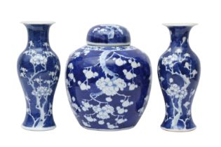 A CHINESE BLUE AND WHITE 'PRUNUS' JAR AND TWO VASES 清十九世紀 青花梅紋罐及瓶兩件