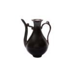 A CHINESE MONOCHROME AUBERGINE-GLAZED EWER 茄皮紫釉執壺 《大明成化年製》款