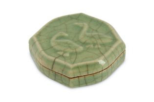 A CHINESE CELADON-GLAZED 'DUCK' COSMETIC BOX AND COVER 青釉印模雙鴨紋菱形蓋盒