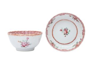 A CHINESE EXPORT FAMILLE ROSE CUP AND SAUCER 十八至十九世紀 外銷粉彩花卉紋盃及盤