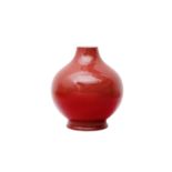 A CHINESE MONOCHROME COPPER-RED VASE 二十世紀 紅釉瓶 《大清嘉慶年製》款