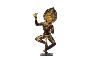 A HIMALAYAN NEPALESE GILT-BRONZE FIGURE OF VAJRAYOGINI / DAKINI