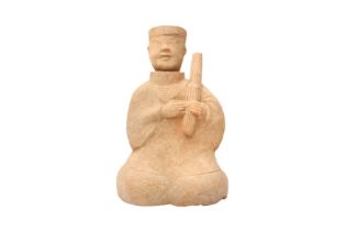 A CHINESE POTTERY FIGURE OF A MUSICIAN 漢 陶樂人坐像