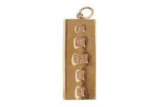 A 9CT YELLOW GOLD INGOT PENDANT, CIRCA 1978