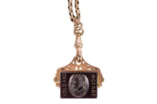 A MOZART CARNELIAN PENDANT ON A FOB CHAIN NECKLACE