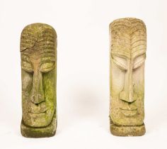 A pair of reconstituted stone Easter Island style heads