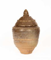 A stoneware lidded jar